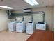 Well-equipped laundry facility with multiple washers and dryers at 29 Montelago Blvd # 309, Henderson, NV 89011