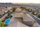 Aerial view of houses with pools, desert landscape, and mountain background at 2920 Josephine Dr, Henderson, NV 89044