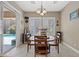 Bright breakfast nook with table and chairs, offering pool views at 2920 Josephine Dr, Henderson, NV 89044