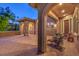 Inviting covered patio and courtyard with stone accents providing a cozy outdoor living space at 2920 Josephine Dr, Henderson, NV 89044