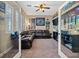 Gathering room with sectional sofa and glass doors at 2920 Josephine Dr, Henderson, NV 89044