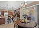 Open kitchen with breakfast nook and view into Gathering room at 2920 Josephine Dr, Henderson, NV 89044