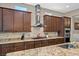 Kitchen with granite countertops, stainless steel appliances, and custom cabinetry at 2920 Josephine Dr, Henderson, NV 89044