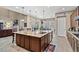 Spacious kitchen with island, stainless steel appliances, and granite countertops at 2920 Josephine Dr, Henderson, NV 89044