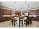 Gourmet kitchen with large island, granite countertops, and stainless steel appliances at 2920 Josephine Dr, Henderson, NV 89044