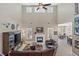Open concept living room with high ceilings and a view into the dining room at 2920 Josephine Dr, Henderson, NV 89044