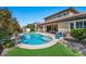 Luxury pool with a large patio and seating area at 2920 Josephine Dr, Henderson, NV 89044