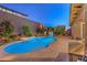 Expansive pool and spa at night, creating a tranquil atmosphere at 2920 Josephine Dr, Henderson, NV 89044