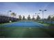 Two lighted tennis courts with green surface at 2920 Josephine Dr, Henderson, NV 89044