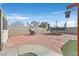 Backyard with patio, trampoline, and grill at 5915 Ablette Ave, Las Vegas, NV 89122