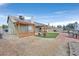 Backyard with pergola, artificial turf, and patio at 5915 Ablette Ave, Las Vegas, NV 89122