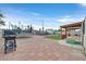 Backyard with patio, pergola, and trampoline at 5915 Ablette Ave, Las Vegas, NV 89122