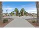 Landscaped community park with walking paths at 5915 Ablette Ave, Las Vegas, NV 89122