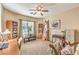 Home office with a desk, chair, and built-in shelving at 6128 Forest Pony Ave, Las Vegas, NV 89122