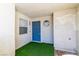 Charming front porch with artificial turf and modern exterior accents at 6250 W Flamingo Rd # 98, Las Vegas, NV 89103