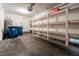 Spacious garage featuring ample storage shelves and a clean, well-maintained floor at 6250 W Flamingo Rd # 98, Las Vegas, NV 89103