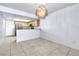 Bright kitchen with granite counters, stainless steel appliances, and tile flooring at 6250 W Flamingo Rd # 98, Las Vegas, NV 89103
