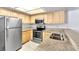 Modern kitchen with stainless steel appliances, granite countertops and stainless steel sink at 6250 W Flamingo Rd # 98, Las Vegas, NV 89103