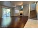 Spacious living area with hardwood floors, fireplace, and access to patio at 6250 W Flamingo Rd # 98, Las Vegas, NV 89103