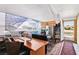Office space with desk, chairs, and natural light at 6409 Youngmont Ave, Las Vegas, NV 89103