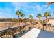 Private deck with scenic view and a pool below at 6541 Ashley Vale St, Las Vegas, NV 89131