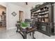 Elegant home office features built-in shelving and large desk at 6541 Ashley Vale St, Las Vegas, NV 89131