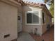 View of the home's entrance with decorative accents at 7820 Foxwood Pl, Las Vegas, NV 89145