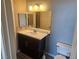 Clean bathroom with updated vanity and toilet at 8309 Cherry Glaze Ave # 201, Las Vegas, NV 89145