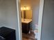 Bathroom with updated vanity and toilet at 8309 Cherry Glaze Ave # 201, Las Vegas, NV 89145