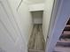 Closet with wood-look flooring and shelving at 8309 Cherry Glaze Ave # 201, Las Vegas, NV 89145