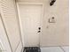 White front door with number 201 at 8309 Cherry Glaze Ave # 201, Las Vegas, NV 89145