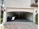 Spacious two-car garage with brick-paved driveway offering ample parking and storage space at 8309 Cherry Glaze Ave # 201, Las Vegas, NV 89145