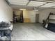 Spacious two car garage with ample space for vehicles and storage at 8309 Cherry Glaze Ave # 201, Las Vegas, NV 89145