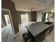 Modern kitchen featuring sleek countertops, stainless steel appliances and an open-concept design at 8309 Cherry Glaze Ave # 201, Las Vegas, NV 89145