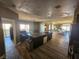 Modern kitchen with stainless steel appliances and island at 8309 Cherry Glaze Ave # 201, Las Vegas, NV 89145