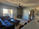 Living room with sectional sofa and fireplace at 8309 Cherry Glaze Ave # 201, Las Vegas, NV 89145
