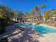 Community pool and surrounding patio area at 8309 Cherry Glaze Ave # 201, Las Vegas, NV 89145