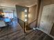 Modern staircase leading to the upper level with metal railings at 8309 Cherry Glaze Ave # 201, Las Vegas, NV 89145
