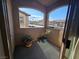 Cozy balcony with potted plants and an arch offering neighborhood views at 8985 S Durango Dr # 2062, Las Vegas, NV 89113