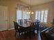 Dining room with a wooden table and seating for six at 8985 S Durango Dr # 2062, Las Vegas, NV 89113