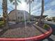 Condo exterior elevation featuring mature palm trees at 8985 S Durango Dr # 2062, Las Vegas, NV 89113