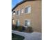 Close up of condo with well-maintained landscaping, and neutral color palette at 8985 S Durango Dr # 2062, Las Vegas, NV 89113