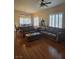 Living room featuring a leather couch and open floor plan at 8985 S Durango Dr # 2062, Las Vegas, NV 89113