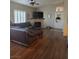 Open living room features wood-look floors and a cozy fireplace at 8985 S Durango Dr # 2062, Las Vegas, NV 89113