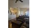 Inviting living room with leather seating and view into dining area at 8985 S Durango Dr # 2062, Las Vegas, NV 89113