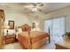 Main bedroom with king bed, dresser, and patio access at 9050 W Warm Springs Rd # 1022, Las Vegas, NV 89148