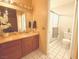 Clean bathroom with shower and updated vanity at 1009 Winwood St, Las Vegas, NV 89108