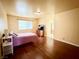 Bedroom with a view of the backyard and ensuite access at 1009 Winwood St, Las Vegas, NV 89108