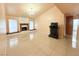 Spacious living room featuring a fireplace and tile flooring at 1009 Winwood St, Las Vegas, NV 89108