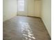 Bright bedroom with a large closet and wood-look flooring at 10290 Gilmore Canyon Ct # 103, Las Vegas, NV 89129